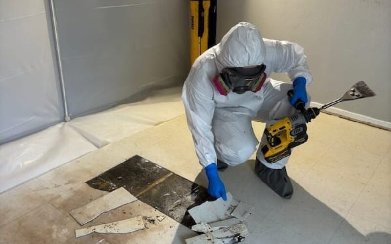 Technicians in protective gear performing certified blood cleanup Dallas, handling biohazard materials safely.